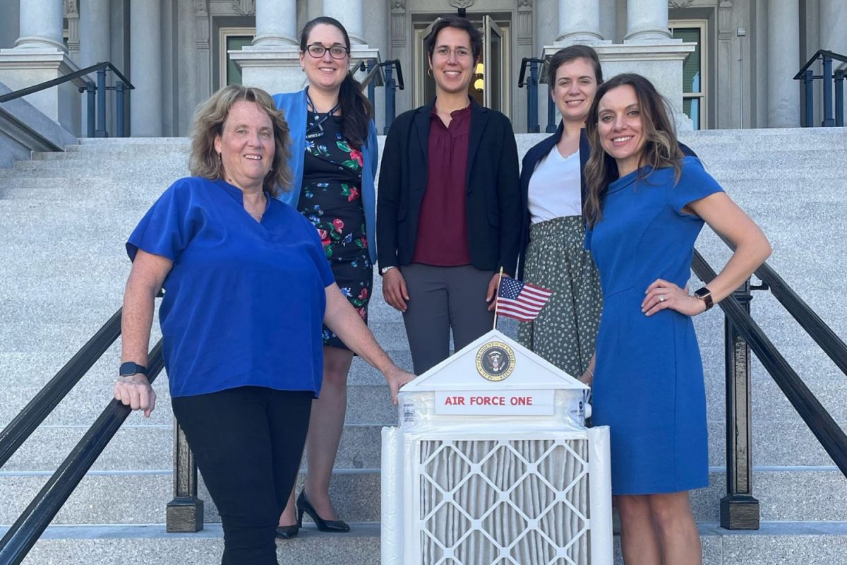 Office of Science and Technology Policy group photo with air purifier